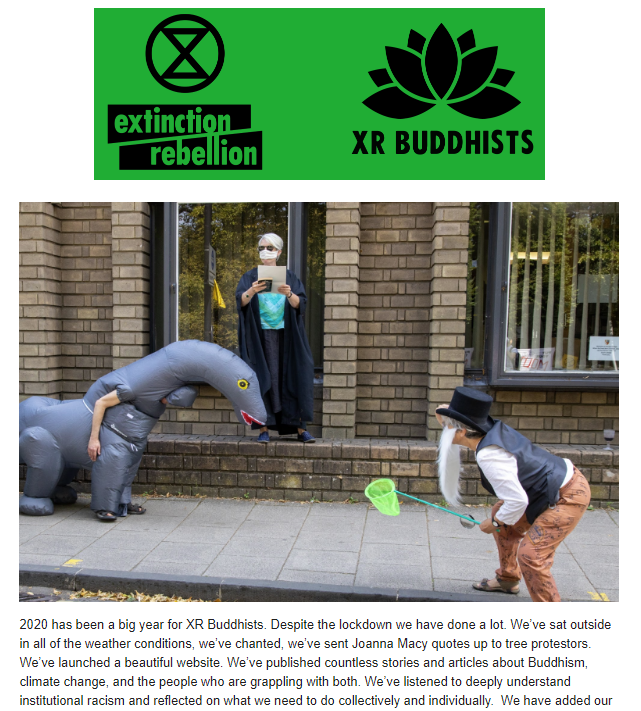 a screen shot of the december newsletter, including a photo of protestor in a dinosaur costume.